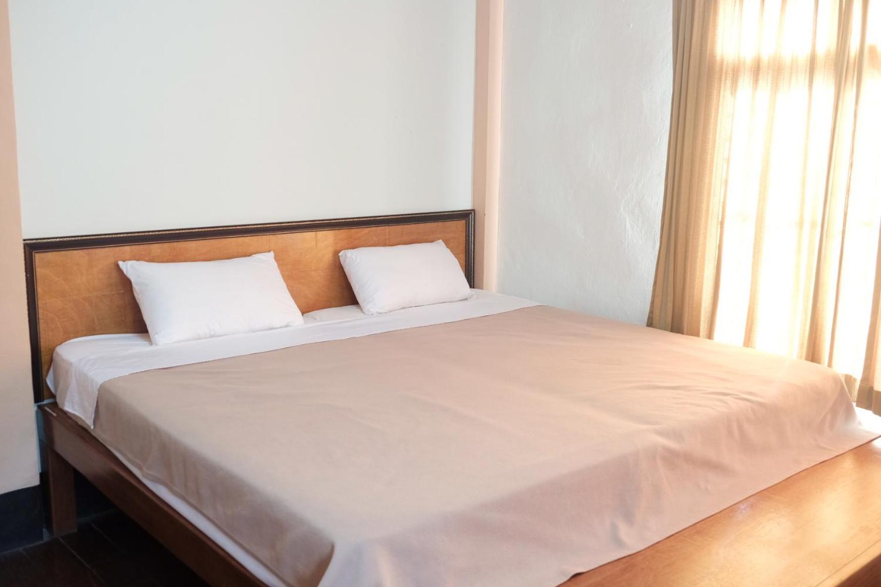 Manilath Guesthouse Ban Houayxay Kamer foto